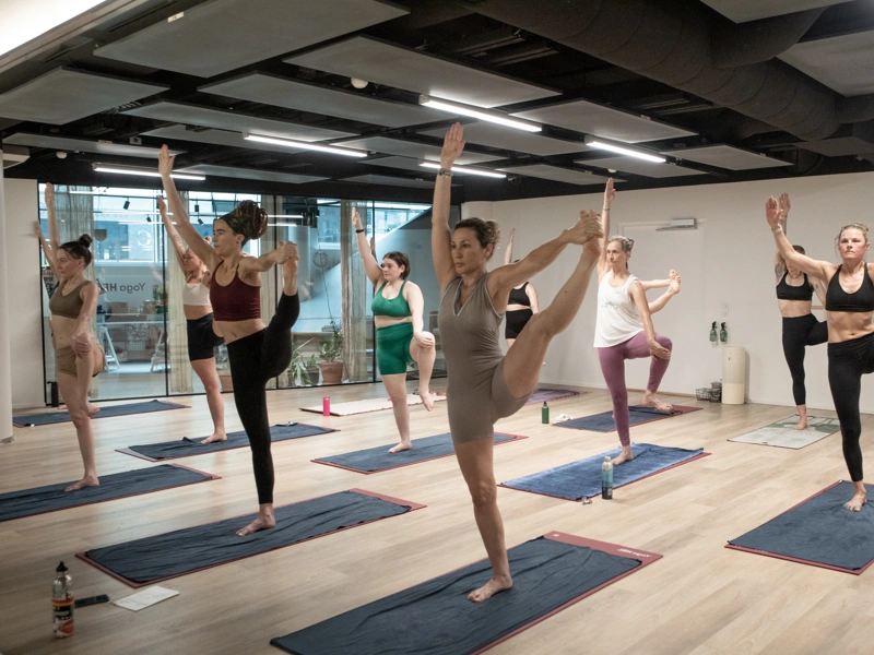 yogis practicing balancing postures during e84 immersion week